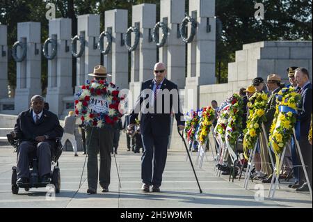 Washington, United States. 11th Nov, 2021. Members of the Paralyzed Veterans of America attend a Veterans Day wreath laying to honor those who served in the U.S. Armed Services during World War II in Washington, DC on Thursday, November 11, 2021. Photo by Bonnie Cash/UPI Credit: UPI/Alamy Live News