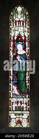 A stained glass window by Lavers, Barraud and Westlake, depicting The Magnificat, St Mary & the Holy Cross, Alderminster, Warwickshire Stock Photo