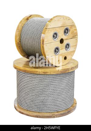 Two wooden spools of electric cable isolated on white background Stock Photo