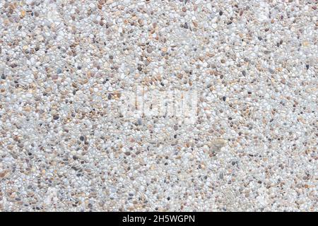 Stone wall made of pebbles for texture Stock Photo