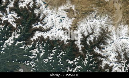 Kathmandu, Nepal, bottom left. The city lies in a valley south of the Himalayas between Nepal and China. Glaciers, and the lakes formed by glacial meltwater, are visible in the top middle of this image. Many communities rely on meltwater from glaciers Ð and Landsat can help track how those glaciers are changing in a warming climate. Earlier imagery has documented the shrinkage of glaciers, and changing lake levels on the adjacent Tibetan plateau. Oct 31 2021, the first day of data collection for Landsat 9. An enhanced version of original Landsat 9 imagery. Credit NASA/USGS Stock Photo