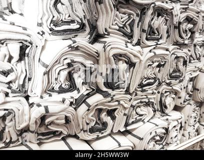 Rolled fabric textured cloth towels background Stock Photo