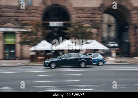 Ukraine, Kyiv - 2 June 2021: Blue Ford Mondeo car moving on the street. Editorial Stock Photo