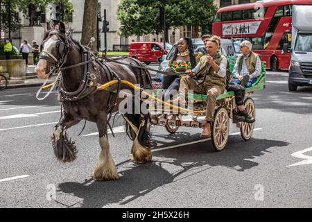 Romany Gypsies and Irish Travellers come together in Parliament Square to protest against a Police Bill which threatens their way of traditional life. Stock Photo