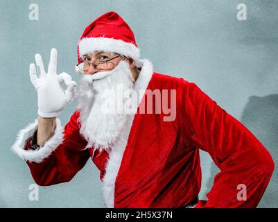 Santa Claus shows with his hand a gesture that everything is in order. Isolate. Stock Photo