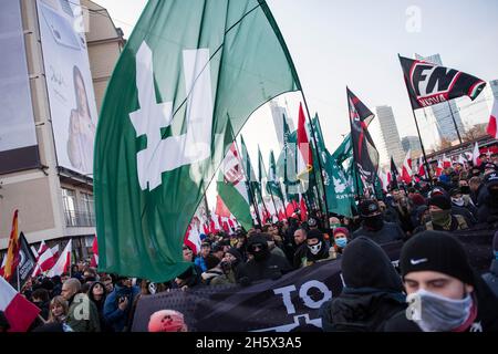 Nationalists wave an Italian Forza Nuova flag and a massive falanga ...