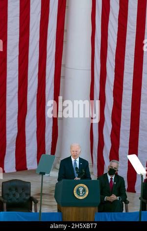 Arlington, USA. 11th Nov, 2021. President Joe Biden speaks in the the Memorial Amphitheater, in Arlington National Cemetery, on Veterans Day, Thursday, Nov. 11, 2021, in Arlington, Va. (AP Photo/Alex Brandon, Pool) Credit: Sipa USA/Alamy Live News Stock Photo