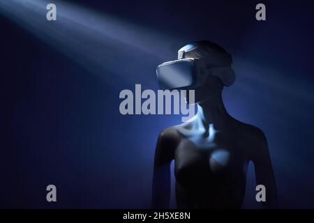 Dummy of Woman in futuristic VR goggles placed under bright projection in dim room Stock Photo