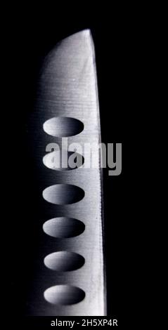 Chef's kitchen knife isolated on black background Stock Photo