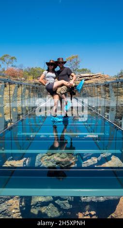 A couple on a bridge over Cobbold Gorge. Stock Photo