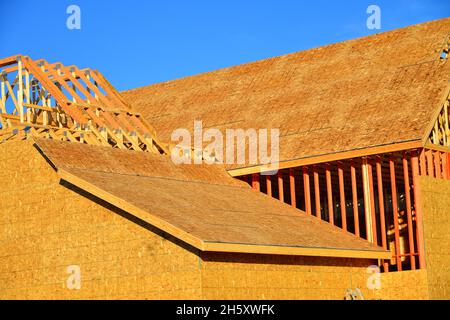New wood frame home under construction. Stock Photo