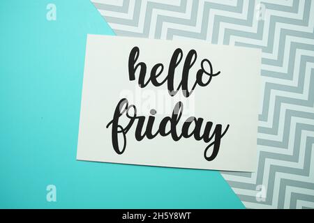 Hello Friday card typography text on blue background Stock Photo
