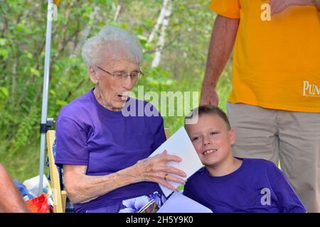 Candid portrait from a family gathering. Receiving birthday greetings, Greater Sudbury, Ontario, Canada Stock Photo