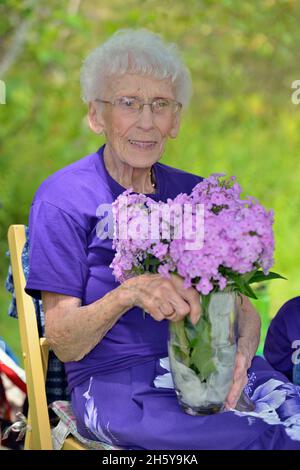 Candid portrait from a family gathering. Receiving birthday greetings, Greater Sudbury, Ontario, Canada Stock Photo