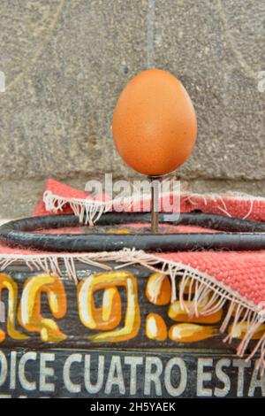 Equatorial exhibits, Ciudad Mitad del Mundo, balancing an egg on a nail, Museo de Sitio Intinan, San Antonio parish, canton of Quito, Ecuador Stock Photo