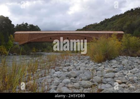 View of the Bridgeport Covered Bridge in Bridgeport, CA; which has the longest clear single span of any surviving wooden covered bridge in the world. Stock Photo