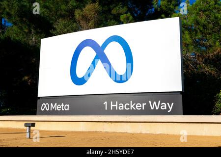Meta logo, sign near Meta Platforms headquarters on 1 Hacker Way. Facebook changed name to Meta Platforms. - Menlo Park, California, USA - October 28,