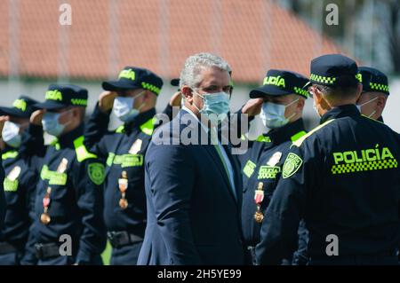 Bogota, Colombia. 11th Nov, 2021. Colombia's president Ivan Duque Marquez during an event were Colombia's president Ivan Duque Marquez and Colombia's Minister of Defense Diego Molano in conmmemoration of the 130 anniversary of Colombia's National Police and the promotion to officers to more than a 100 police members, in Bogota, Colombia on November 11, 2021. Credit: Long Visual Press/Alamy Live News Stock Photo