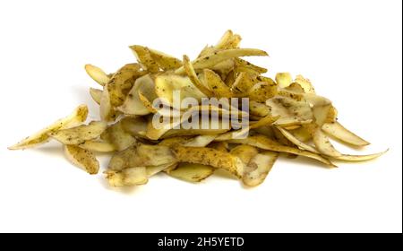 Potato peel after cleaning. Organic waste isolated on white background. Stock Photo