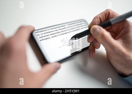 Contract E Signature. Employee Signing Law Document Stock Photo