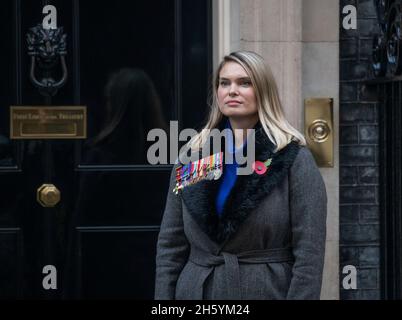 Downing Street, London, UK. 11 November 2021. Alice Wingate, the grand-daughter of Major General Orde Wingate (the Chindits) arrives in Downing Street for a photograph at the front door after attending the Remembrance Day Parade in Whitehall. She wears her grandfathers impressive medals including the DSO & Two Bars. Credit: Malcolm Park/Alamy Stock Photo