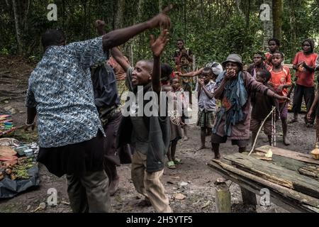 September 2017. The Batwa Pygmies in Uganda try to make ends meet by hosting trail walks; cultural tours that include examples of where and how they use to live in the forest Stock Photo
