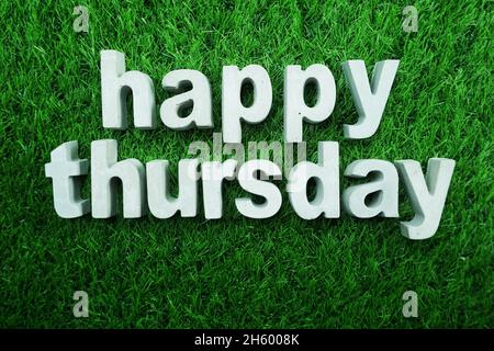 Happy Thursday made from concrete alphabet Stock Photo