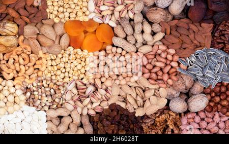 Assortment of nuts and fruits collected in one  frame. Stock Photo