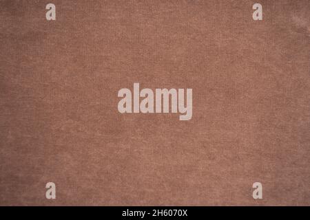 a light brown textured velvet fabric background Stock Photo