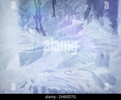 natural frosty patterns on the window glass gradient illumination Stock Photo