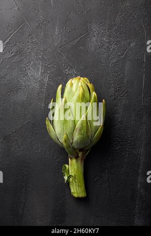 Artichokes on a black background. Stock Photo