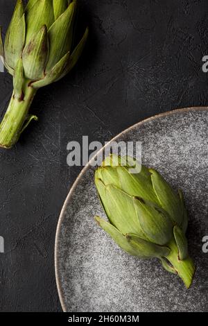 Artichokes on a plate. Stock Photo