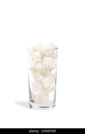 Refined sugar cubes in a clear glass glass Stock Photo