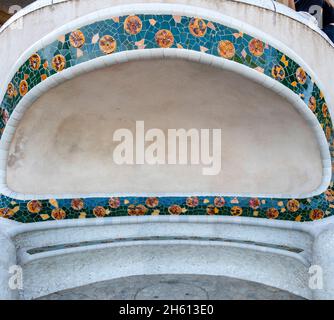 Mosaic bench in Park Guell. Mosaic sculpture in the Parc Güell designed by Antoni Gaudí located on Carmel Hill, Barcelona, Spain. Stock Photo