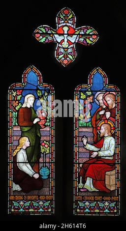 A stained glass window by Frederick Preedy depicting Jesus in the house of Martha and Mary of Bethany, St Andrew's Church, Cleeve Prior, Worcestershir Stock Photo