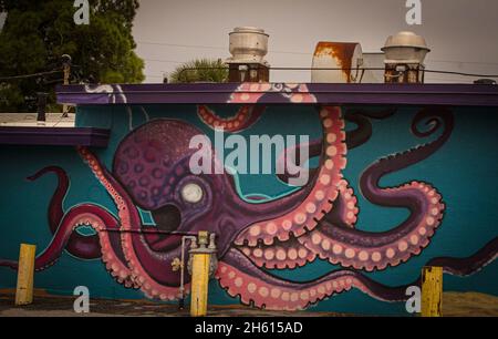 Beautiful art piece on the side of a local business in Tarpon Springs, FL Stock Photo