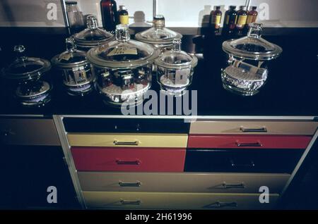 Desiccators in which cells to be used in an infrared spectrophotometer are stored. The desiccators, located at the environmental protection agency Mississippi test facility at bay st louis, look like large candy jars and keep the cells dry; Mississippi  ca. March 1974 Stock Photo