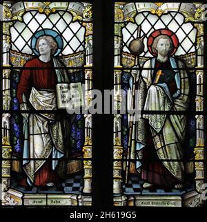 Stained glass window by Shrigley & Hunt depicting St James the Great and St John, St James Church, Harvington, Worcestershire Stock Photo