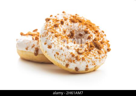 Sweet glazed donut with sprinkles isolated on white background. Stock Photo