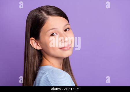 Profile photo of pretty brunette daughter little girl wear blue shirt isolated on violet color background