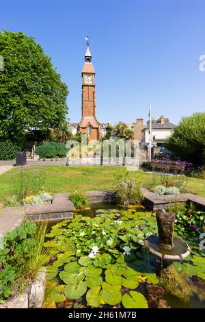 Seaton a seaside town in East Devon with a Victorian Memorial clock and lily pond with flower beds Jubilee gardens Seaton Devon England UK GB Europe Stock Photo