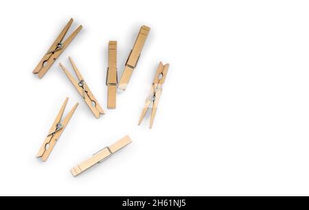 Wooden clothspins isolated on white background with copyspace Stock Photo