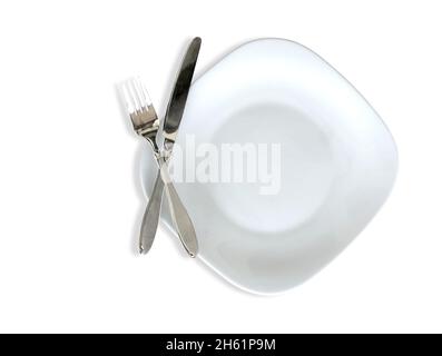 Isolated shot of white square plate with cutlery on white background Stock Photo