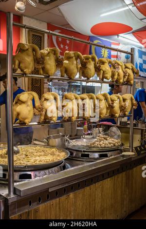 chicken skewers in jiufen old street,historic mountain village with narrow streets Stock Photo