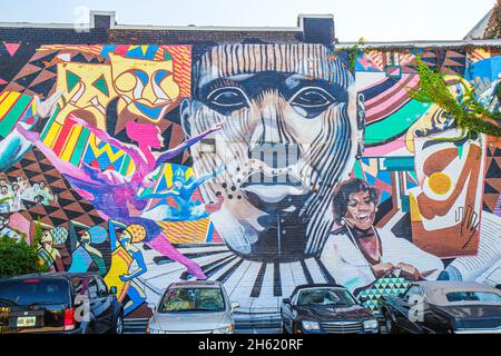 Atlanta Georgia,Edgewood Avenue building wall mural dance,theatre theater face,mask Black parking lot Stock Photo