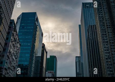 urban canyon in the evening in hong kong Stock Photo