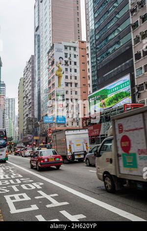 urban canyon and traffic in hong kong Stock Photo