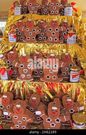 selling gingerbread men at the christmas market Stock Photo