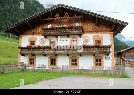 house,farm,ancestral farm,painting,floral decoration,fence,gschnitz,wipptal,tyrol,austria Stock Photo