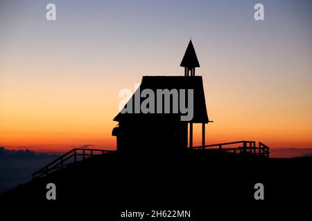 chapel on the steinling alm below the kampenwand,bavaria,upper bavaria,kampenwand (1669 m) in the chiemgau,sunrise chiemgau alps,near aschau,southern germany,germany Stock Photo